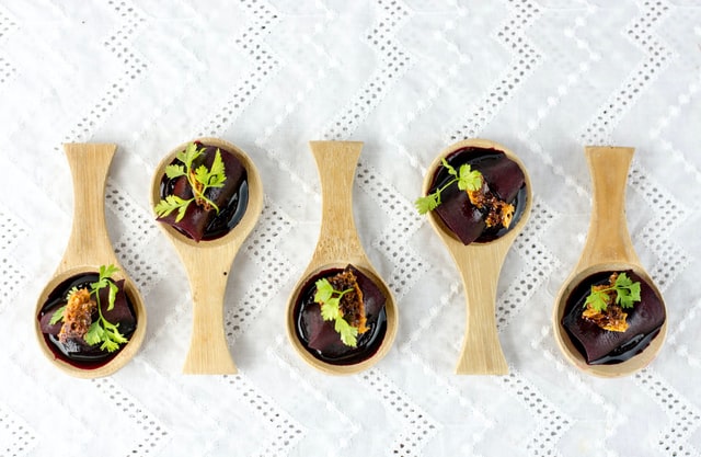 various wood table spoon with chocolate dessert